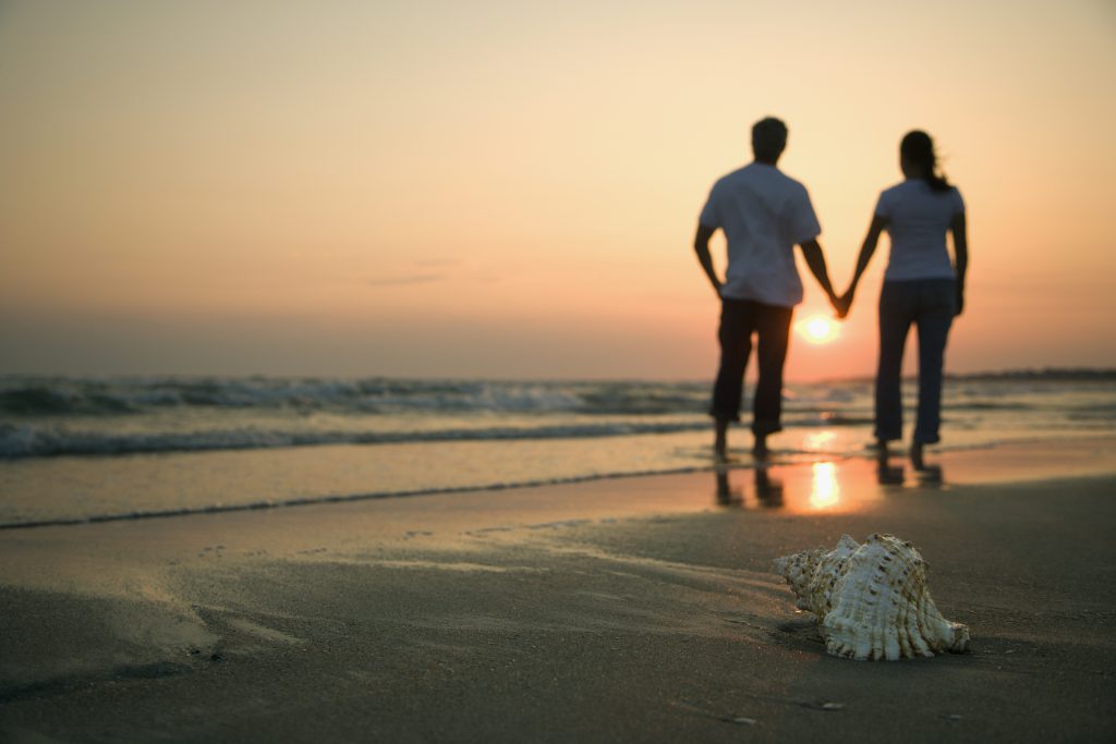 Couple takes in a Fall Sunrise