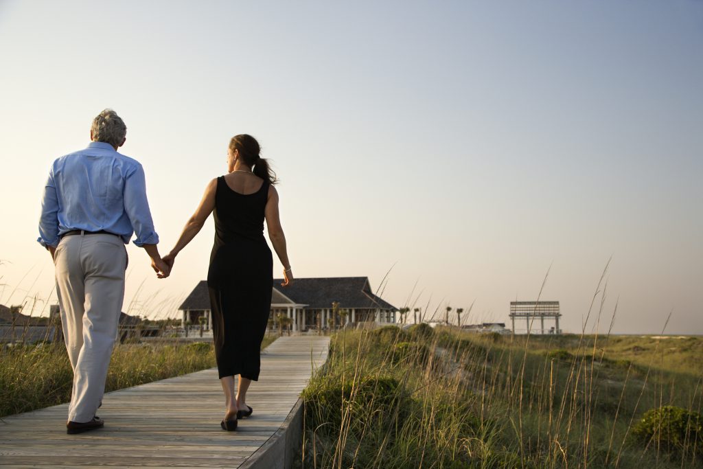 couple strolling hand in hand